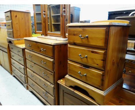 ASSORTED MODERN PINE BEDROOM FURNITURE including four chests, a blanket trunk and dressing table mirror (6)The two bedside ta