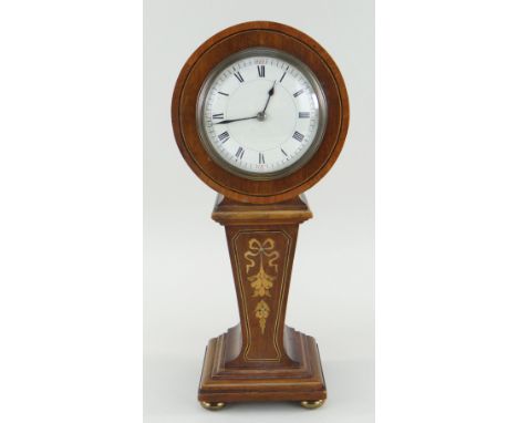 EDWARDIAN MARQUETRY MANTEL TIMEPIECE, of balloon shape, white enamel roman dial, drum case on tapering column, gilt metal fee
