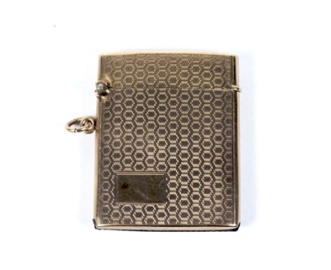 A 9ct gold engine-turned vesta/match case. With a vacant rectangular reserve, Birmingham 1925, approx. 5cm high (2 inches), 2