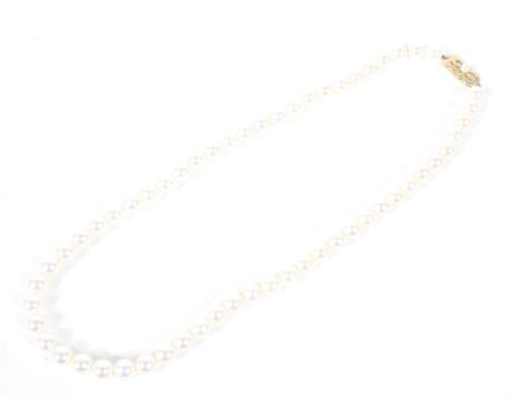 A vintage Mikimoto cultured-pearl single row necklace. The 57 very slightly graduated beads graduated approx. 7.0-7.5mm diame