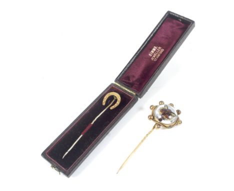 A late Victorian gilt-metal and Essex crystal stick pin depicting a fox mask. the cabochon approx. 10.8mm diameter set within