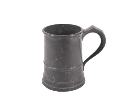 A 19th century pewter quart tankard, with name and address inscribed to the body. H14.8cm