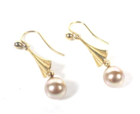A pair of vintage gold and 6mm diameter golden-cultured-pearl single bead pendent earrings. Each on a shepherds-crook fitting