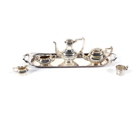 A vintage miniature silver oval part spiral-fluted four piece tea and coffee service on a rectangular tray. All with the make