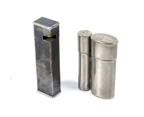 A vintage Dunhill 'Cartier-Licence' rectangular pocket cigarette lighter. With a petrol mechanism, and a hinged cover, 6.5cm 