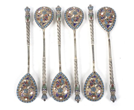 A set of six early 20th century Russian parcel gilt and cloisonne enamelled coffee spoons. Each bowl back polychrome decorate
