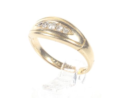 A late Victorian 18ct gold and diamond five stone ring. The graduated single and old-cut stones grain set within a tapering c