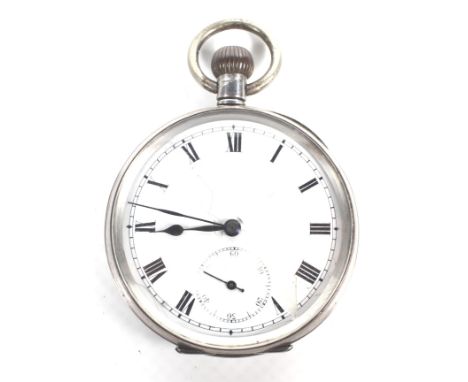 A Swiss silver cased open face keyless pocket watch, circa 1910. The white enamel dial with black Roman numerals and a subsid