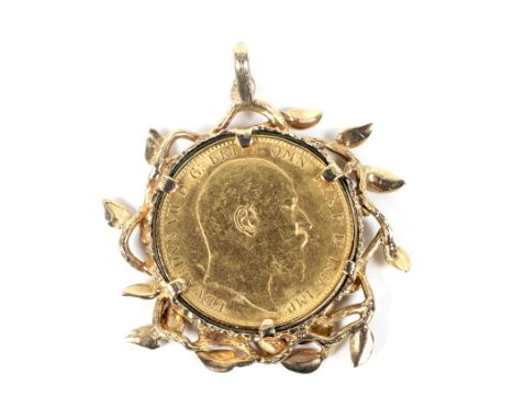 A sovereign 1903, mounted in a vintage abstract leaf and branch pendant. Apparently unmarked, 12.8g gross