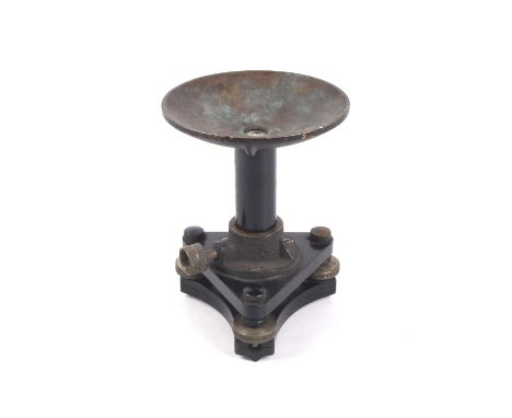 An ER Watts & Sons surveyor's levelling stand. WIth a spirit level in a rounded dish. H15cm