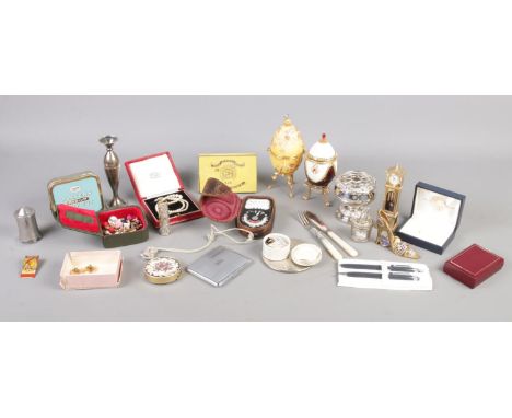 A small box of collectables. To include a Weston Master II light meter, a faux pearl necklace and State Express Cigarette box