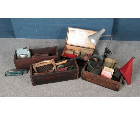Three vintage crates containing a variety of collectables, to include Anglepoise lamp, cased bowls, red racing flag (purporte