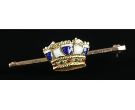 A 9ct Gold bar brooch, set with central enameled crown. Total weight: 4.22g  central piece of crown has cracked enamel.
