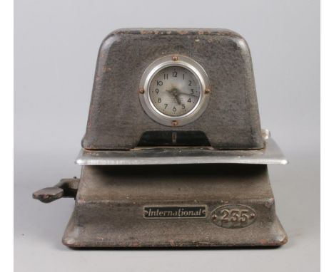 A vintage International Time Recorder Model 2100 clocking in machine.  