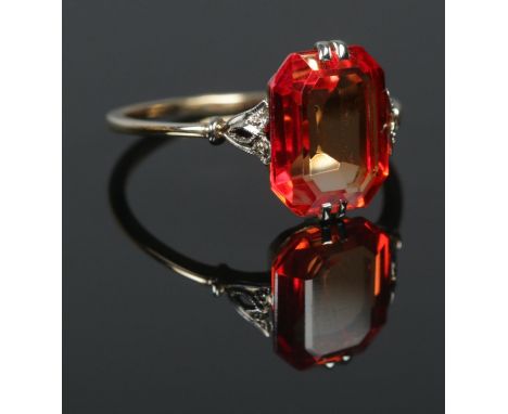 An art deco 14ct Gold ring, set with rectangular orange stone. Size K. Total weight: 1.71g  Not hallmarked, tests as 14ct.