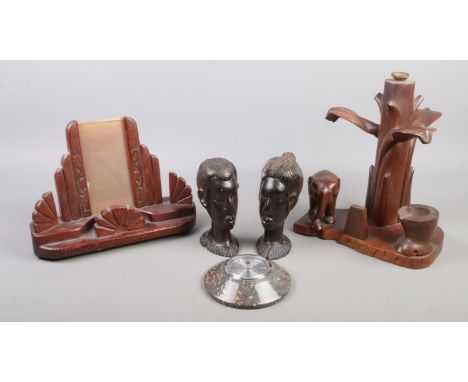 Four pieces of woodenware. Including busts, art deco picture frame, table lamp, etc.  