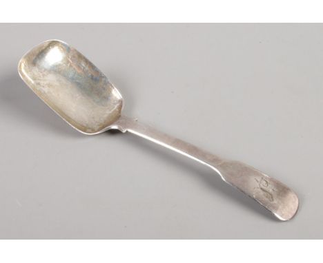 A George IV silver caddy spoon, with monogramed handle. Assayed in Birmingham, 1822. Weight: 14.37g.  