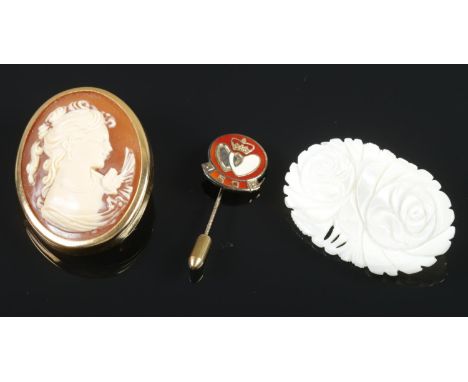 Three assorted boxed brooch's and pin. To include a Silver gilt and enamel National Blood Service pin, a Mother of Pearl carv