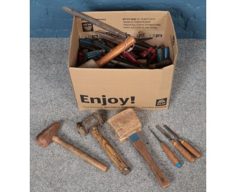 A box of assorted vintage hand tools.  