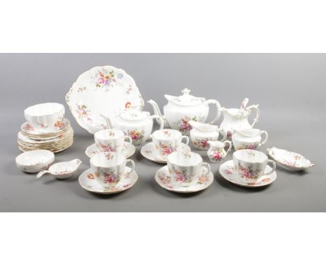 A thirty two piece Royal Crown Derby part tea set. Decorated in the 'Derby Posies' design. To include two teapots, three milk