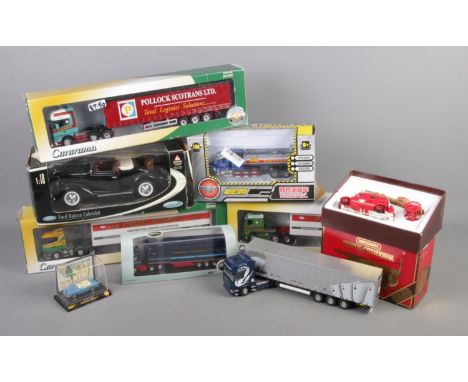 A selection of boxed die-cast vehicles. To include a Matchbox 1936 Leyland Cub Fire Engine FK-7, three Hongwell trucks, a She