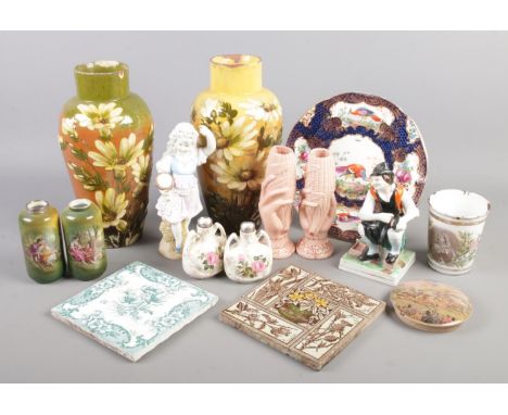 A quantity of mainly 19th century ceramics. Includes terracotta vases, silver mounted vases, enamel commemorative beaker, til
