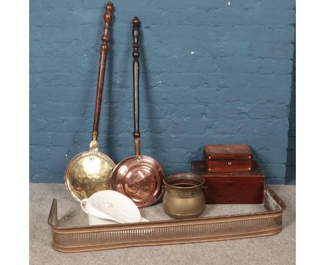 A quantity of miscellaneous. To include brass fender, two warming pans, brass planter etc  