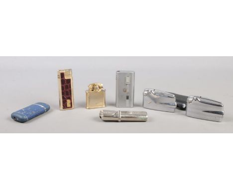 A collection of seven vintage lighters. To include Colibri and Ronson examples.  