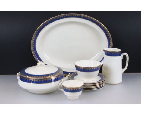 George Jones ' Crescent Ivory ' Part Dinner Service comprising Three Graduating Service Plates, 12 Dinner Plates, 6 Side Plat