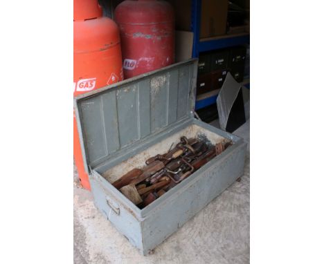 Early to Mid century Metal Tool Chest containing a quantity of old tools mostly Wooden Planes plus some Braces, Wooden Mallet