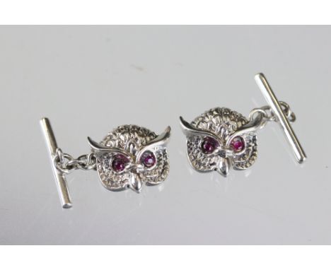 Pair of silver owl shaped cufflinks with ruby eyes 