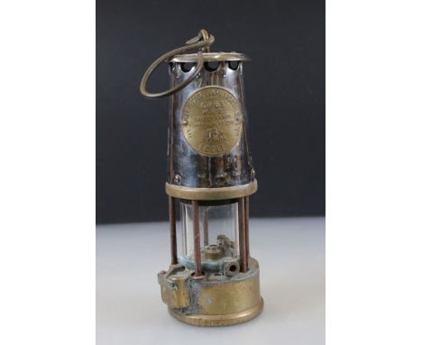 Original Brass and Steel Protector Safety Miners Lamp, Type 6 - Type SL, marked 78 owners Eccles, together with Spare Parts L