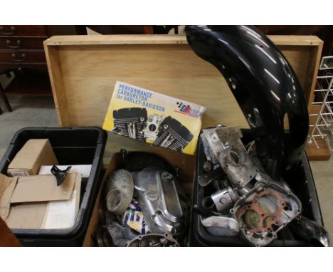 A collection of used Harley Davidson &amp; Kawasaki motorcycle parts to include fenders, engine cases and exhaust parts. 