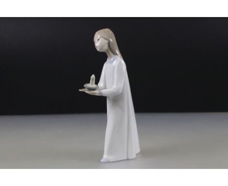 Lladro Figurine of a Girl carrying a chamber stick, 21cm high 