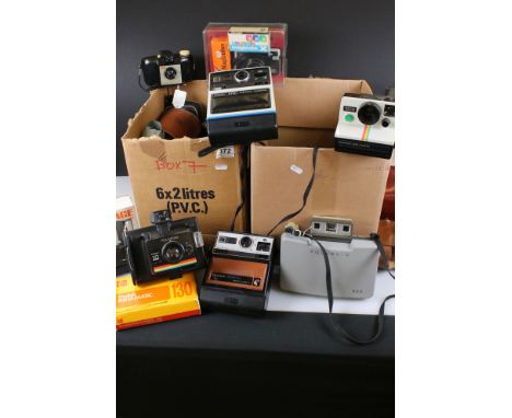 A large collection of cameras to include Kodak, Polaroid and Minolta examples. 