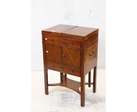 George III Mahogany Washstand, the twin hinged lid opening to a washbowl well containing a blue and white ceramic washbowl an