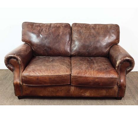 SOFA, close nailed brown leather two seater, 88cm H x 163cm x 101cm. 