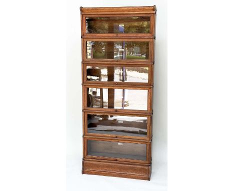 GLOBE WERNICKE BOOKCASE, a tall set early 20th century oak with six graduated stacking sections, plinth and cornice, 205cm H 