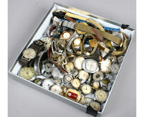 A large quantity of mostly vintage manual watch heads, watches and pocket watches including Olympus, Timex etc.