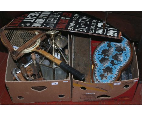 Two boxes of wooden and metalwares including novelty signs, cast iron trough, vintage tennis racket, hand tools etc.