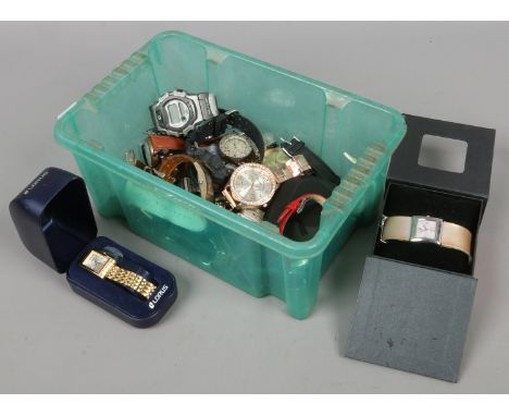 A box of assorted wristwatches including Casio G-shock, Timex, Lorus etc.