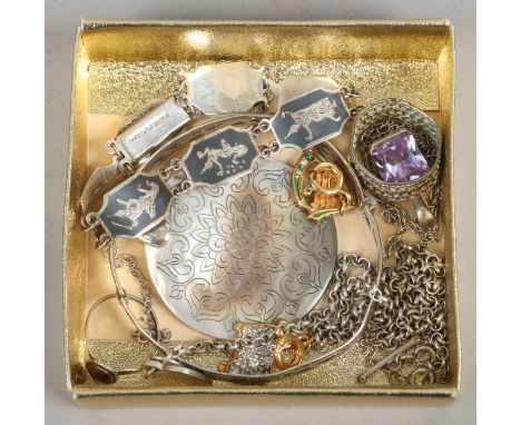 A group of silver jewellery including a bangle, pendant, rings etc.