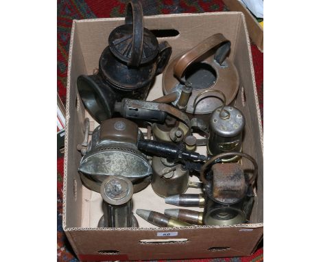 A good box of metalwares to include miners lamp, lanterns, brass shell cases, copper kettle etc.