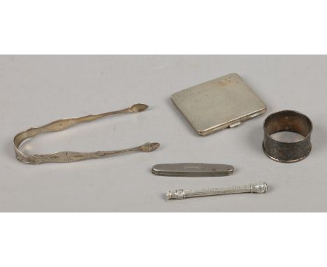 A collection of mainly silver items, to include cigarette case, Victorian propelling pencil, napkin ring, sugar tongues, Rich