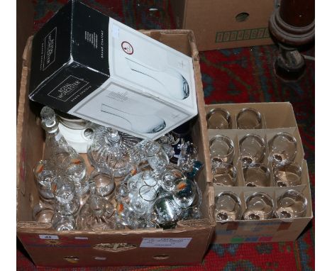 A box of glassware to include drinking vessels and art glass, along with a boxed Royal Worcester carafe.