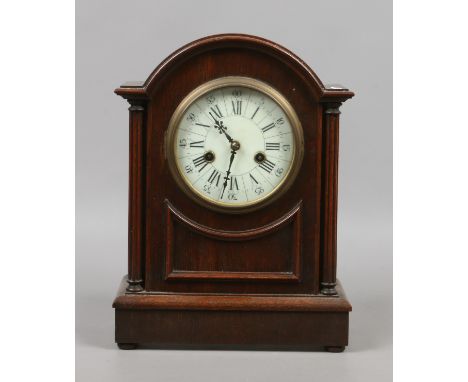 A Victorian oak cased dome top mantel clock with white enamel dial (AF).