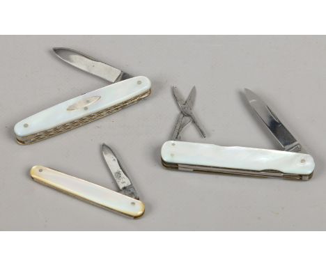 Three pocket knives with mother of pearl scales including Lockwood Brothers of Sheffield and workback examples.