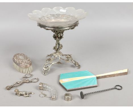 A collection of silver and silver plate items to include silver and enamel mirror novelty sugar tongues etc.