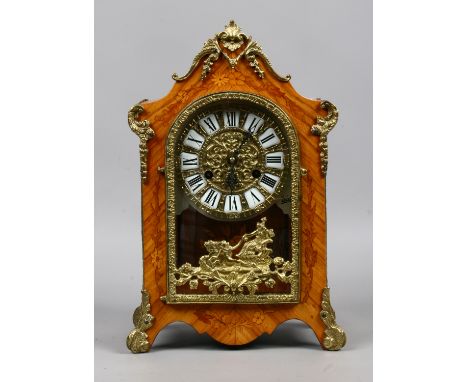 An inlaid Satinwood brass mounted French style eight day mantle clock, quarter chiming on a double bell 