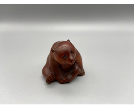 Japanese hand carved netsuke of a panda detailed with black bead eyes [3.5 cm] 